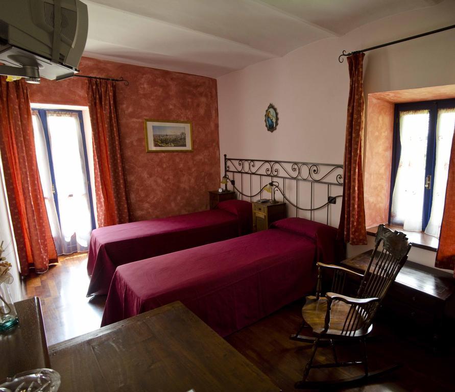 B&B Il Sole Delle Rive 시니오 객실 사진